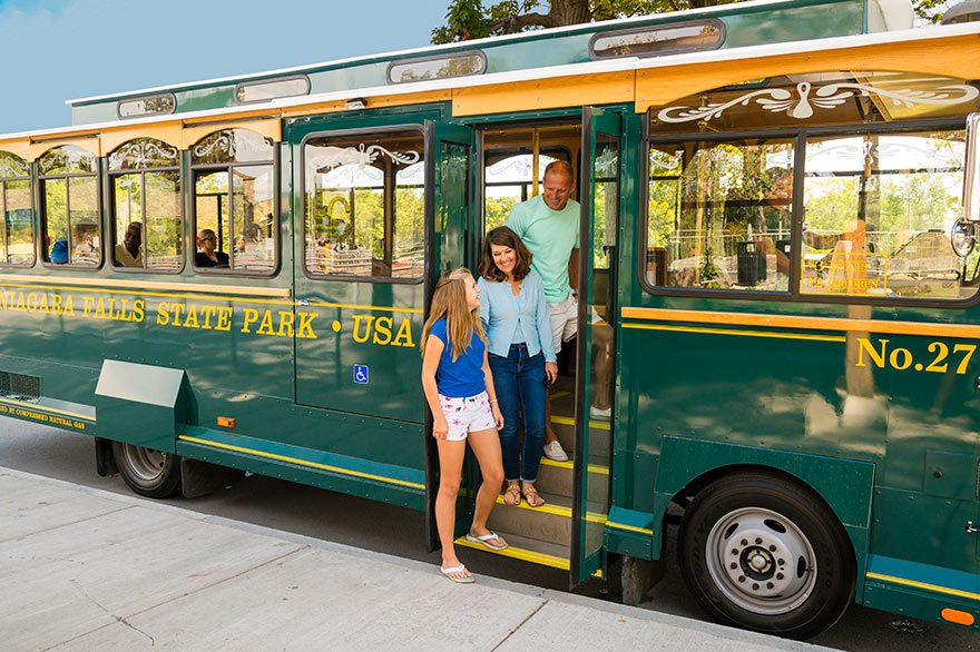A family exits from the Trolley at Niagara Falls State Park 