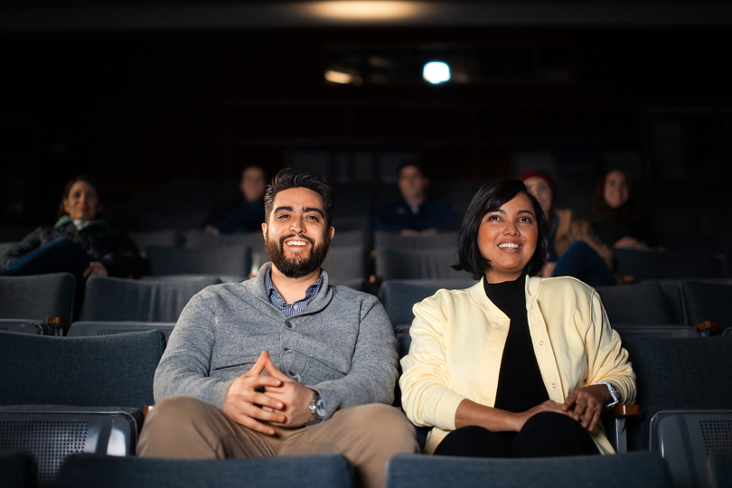 Two guests viewing a film at Niagara Falls State Park