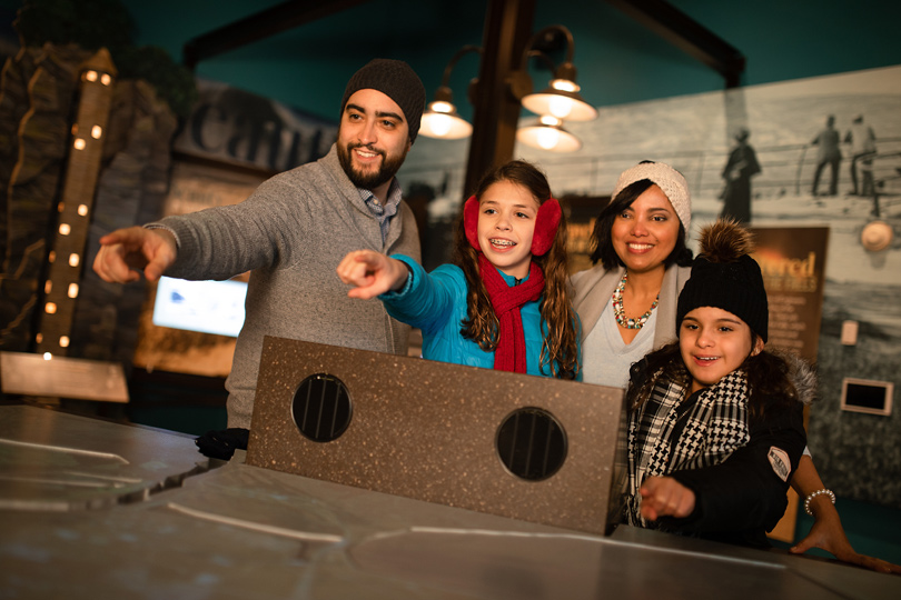 Guests exploring a museum display at Niagara Falls state park
