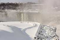 Experience the serenity of Niagara Falls State Park in the winter